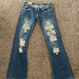 Size 6 ripped flare blue jeans